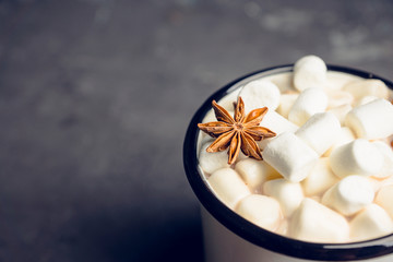 Sweet hot chocolate in mug. Christmas drink with marshmallow. Selective focus. Shallow depth of field. 