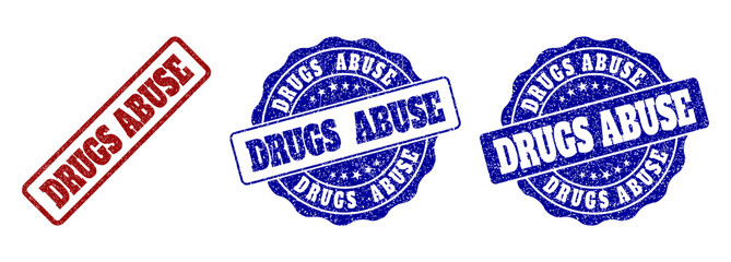 DRUGS ABUSE scratched stamp seals in red and blue colors. Vector DRUGS ABUSE labels with grainy effect. Graphic elements are rounded rectangles, rosettes, circles and text labels.