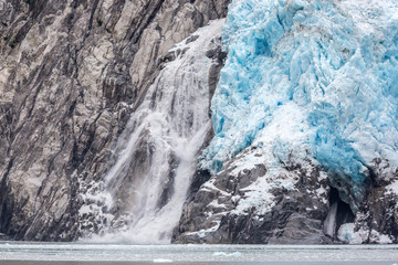 A glacier with blue ice in Kenai Fjords National Park in Alaska. 