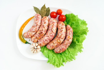 raw sausages with spice