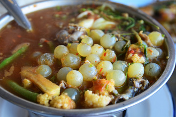 Giant sea catfish eggs with spicy  sour soup and vegetable