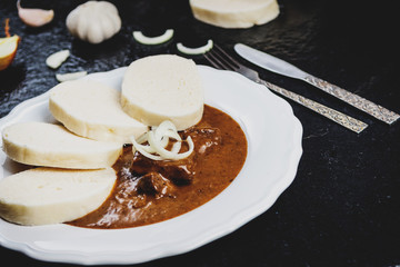 Beef goulash with dumplings