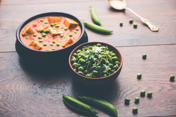Green peas or matar paneer curry recipe, served in a bowl. selective focus