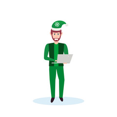 man christmas elf santa helper concept using laptop flat full length male cartoon character isolated