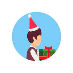 boy wearing hat holding gift box happy new year merry christmas concept male face avatar profile cartoon character portrait isolated