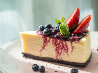 One piece of strawberry cheese cake on white plate, for cafe or bakery shop.