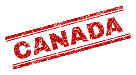 CANADA seal stamp with corroded texture. Red vector rubber print of CANADA text with corroded texture. Text caption is placed between double parallel lines.