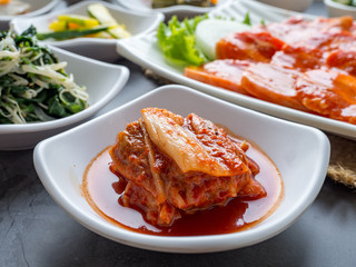 Set of slide food in white small plate serve in korean style barbecue restaurant.