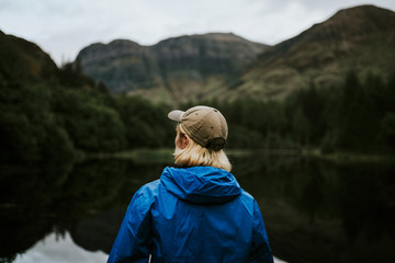 Man standing by the riverside in the Highlands © Rawpixel.com