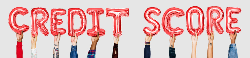 Hands holding credit score word in balloon letters