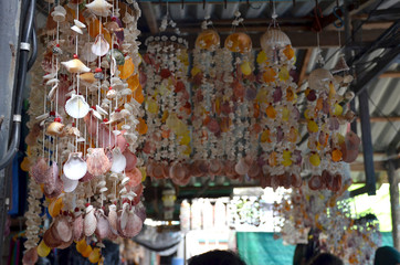 Sea shell home decor at a village market in Thailand.