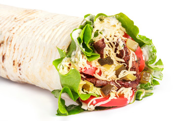 Burrito wraps from fillet grilled beef, lettuce, slices of fresh tomatoes, pickles and cheese on...