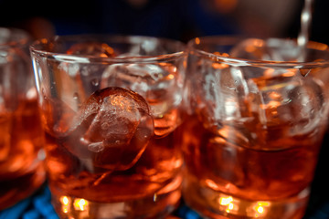  bartender prepares a  cocktail in the nightclub.