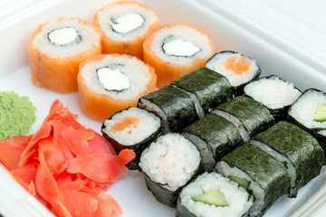 rolls and sushi, Japanese fast food, boxed food, lunch