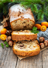 Fototapeta na wymiar traditional homemade stollen with dried fruits and nuts