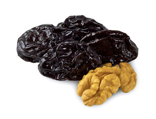 dried plums and walnuts isolated