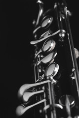 Fototapeta na wymiar An isolated oboe on a black background