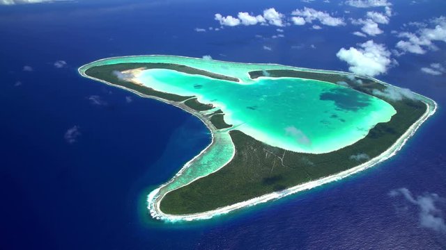 Aerial of Tupai Heart Island coral lagoon atoll French Polynesia South Pacific 