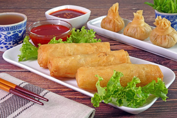 Spring rolls : Crispy deep fried spring rolls and wontons, famous Chinese appetizer.