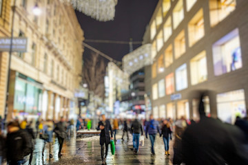 crowd of people walking on Christmas streets 