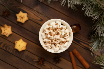 Winter hot Christmas chocolate or cocoa with marshmallow with decorations. A cup of hot chocolate...