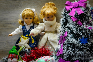 Winter holiday decoration for Christmas and new year with dolls and Christmas adornment