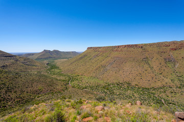 The arid landscape of the Karoo National Park in South Africa.