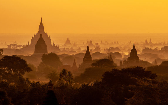 Amazing sunrise with the ancient architecture of a thousand Pagodas in Bagan Kingdom, Myanmar