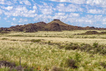 The arid landscape of the Karoo National Park in South Africa.
