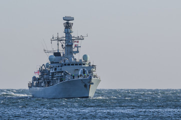 Fototapeta na wymiar WARSHIP - Frigate on a patrol in the sea
