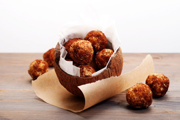 Useful fitness sweets from dried fruits, nuts and seeds (no sugar) in coconut shell. Vegan, vegan...
