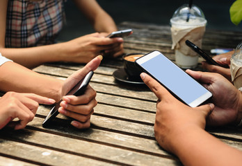 Group of students having fun together with smartphones - Closeup of hands social networking with mobile phone online /Technology and phone addiction concept / social media concept