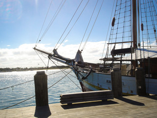 An old sailboat at the pier