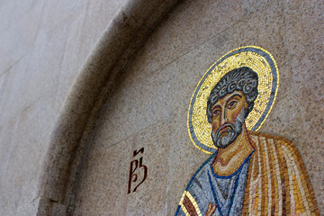 mosaic of a saint on the church wall