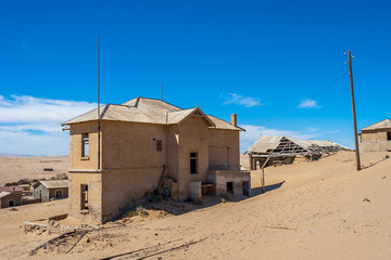 Kolmanskuppe, aslo known as Kolmanskop, a diamond mining ghost town on the Skeleton Coast of Namibia.