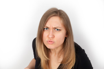 portrait of beautiful angry woman  on white background