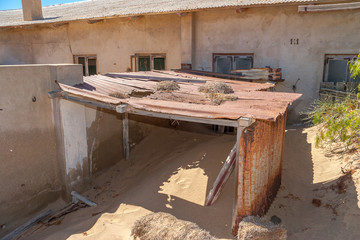 Kolmanskuppe, aslo known as Kolmanskop, a diamond mining ghost town on the Skeleton Coast of Namibia.