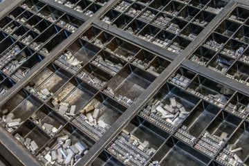 Eguipment of Typography workshop. A many old Metallic Letters for Printing.