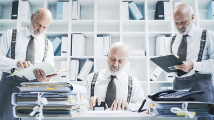 Businessman working on different tasks at the same time