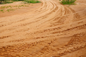 Tire tracks on the sand