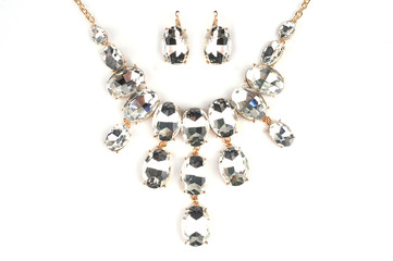 Jewelry pendant on a white isolated background. Jewelery, jewelry. Pendant, earrings, necklace, bezel.