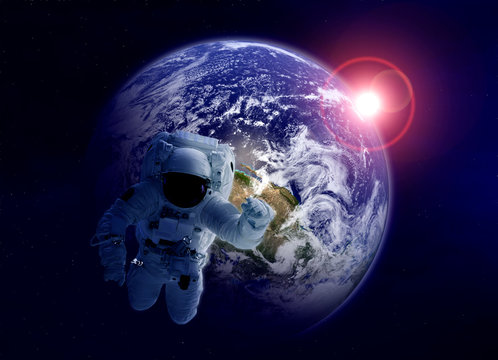 Astronaut in space. Elements of this image furnished by NASA - Powered by Adobe