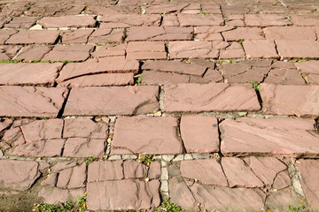stone block walkway damage