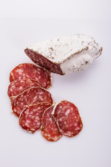 Saucisson sec delicious french salami on a white background