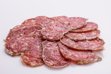 Saucisson sec delicious french salami on a white background