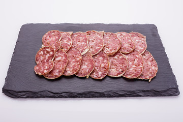 Saucisson sec delicious french salami on a white background