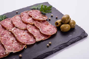 Saucisson sec delicious french salami on a white background