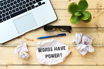 Words have power on white paper on office wooden table
