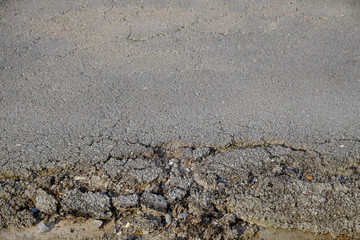 closeup damage asphalt road