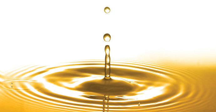 Liquid Gold Or Olive Oil Drop And Ripple Wave,abstract Background